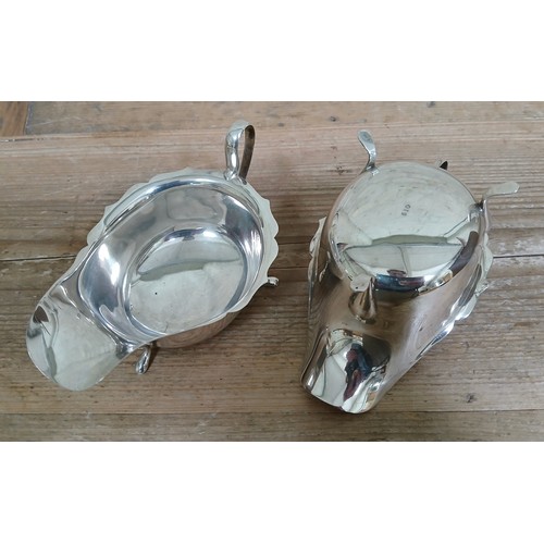 218 - A pair of hallmarked silver sauce boats, length 15cm, weight 6.8ozt.