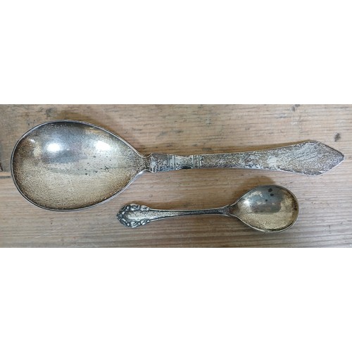 202 - Two Georg Jensen silver spoons, length 14.5cm & 26cm, weight 4.8ozt.