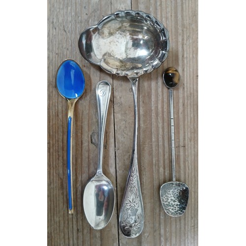 213 - Foreign silver comprising a silver gilt blue enamel spoon, a ladle and a spoon with tiger's eye fini... 