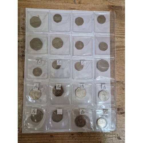 311 - A file of assorted collectable 50p & 20p coins.