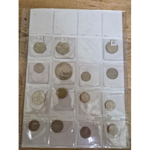 311 - A file of assorted collectable 50p & 20p coins.