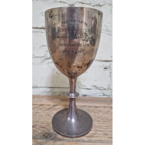 193A - A hallmarked silver goblet inscribed  'PRESENTED TO HARRY B SUTCLIFFE FOR BEST ATTEMPT ON DROME OF D... 