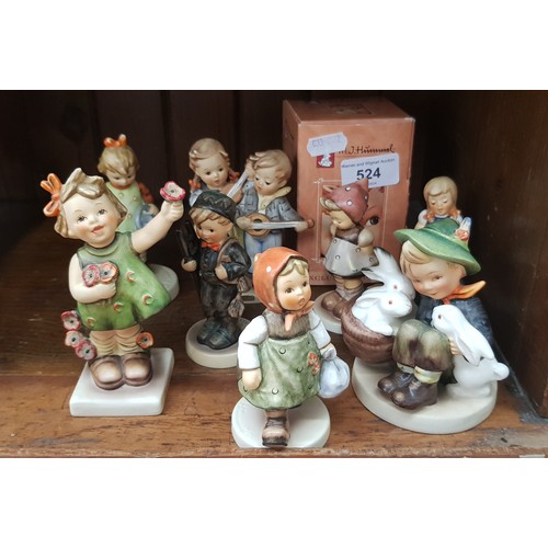 524 - 8 Hummel figurines including ‘Playmates’ (1950-55), ‘Happy Days’ (1950-72), a boxed exclusive editio... 