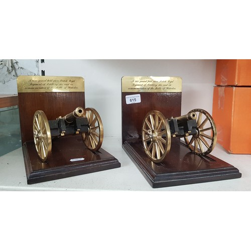 615 - Pair of Bassett-Lowke model cannon loose on wooden base to form book ends