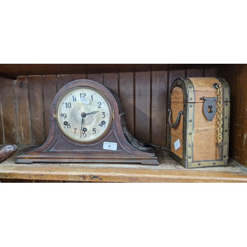 4 - A mantle clock with key and a wooden casket