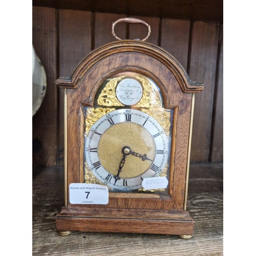 7 - A Chas Frodsham walnut cased carriage clock.