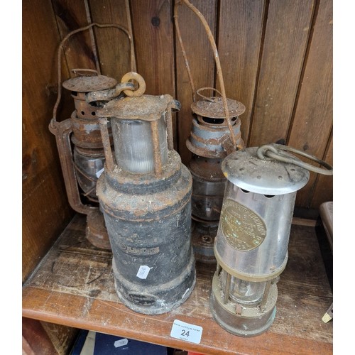 24 - 2 paraffin storm lamps and an Oldhams Type S miner's lamp and a repro miners lamp