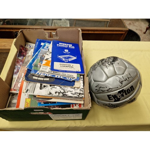 49 - A box of Everton FC football programmes together with a signed Everton FC football. signatures inclu... 