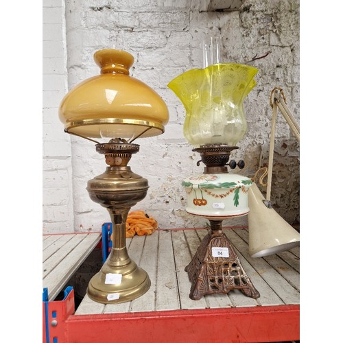 84 - 2 oil lamps with glass shades