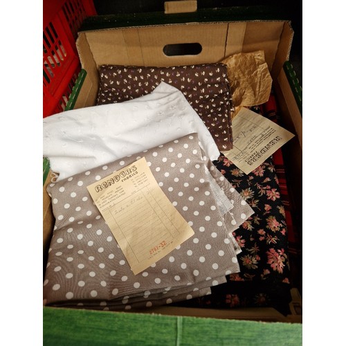 87 - A box of dressmaking material and a kilt