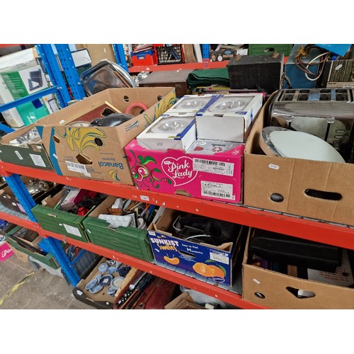 120 - Eight boxes of assorted household items to include lights & lanterns etc.