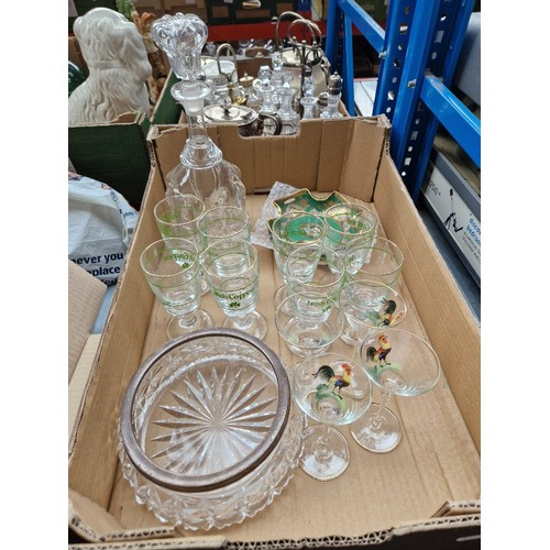 250 - A box of assorted glass ware to include a hallmarked silver rimmed bowl, vintage hand blown decanter... 