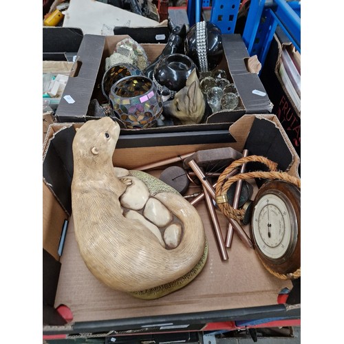 133 - 2 boxes of miscellaneous items including glass ware, large otter figure and other animal figurines, ... 