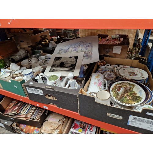 200 - Four boxes of assorted china including collectors plates, tea wares etc