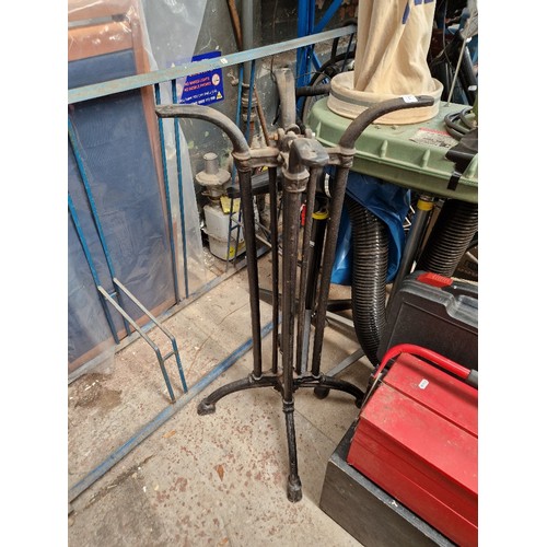 179 - A wrought iron base for a tall garden table (height appx 105cm)