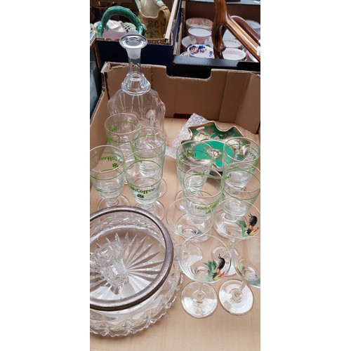 250 - A box of assorted glass ware to include a hallmarked silver rimmed bowl, vintage hand blown decanter... 