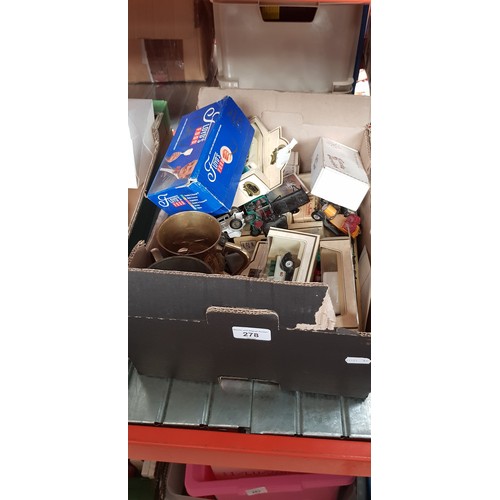 278 - A box of mixed items including toy cars, (some boxed), plated ware, copper plated brass tankard, col... 