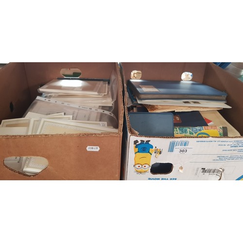 303 - Two boxes of assorted stamp albums & first day covers etc.