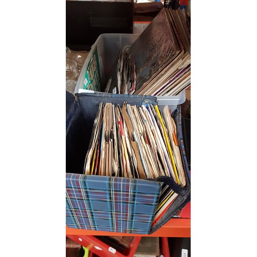 316 - A box of singles and LPs and a case of 45s