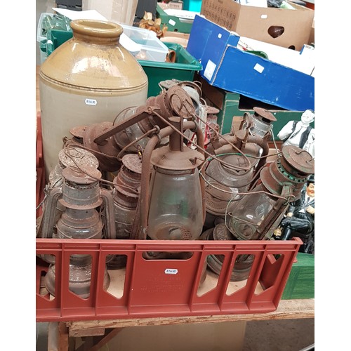 350 - A box of Tilley lamps and a large earthenware storage bottle