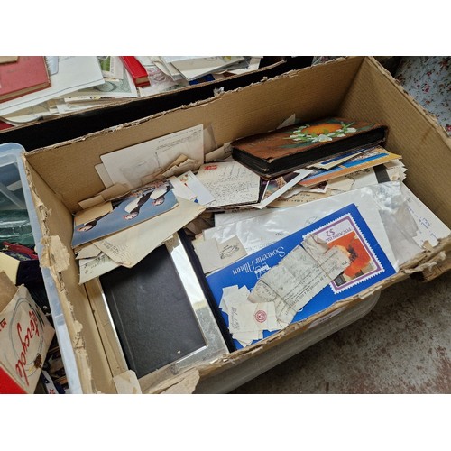 369 - A box of assorted postcards & postal emphemera.