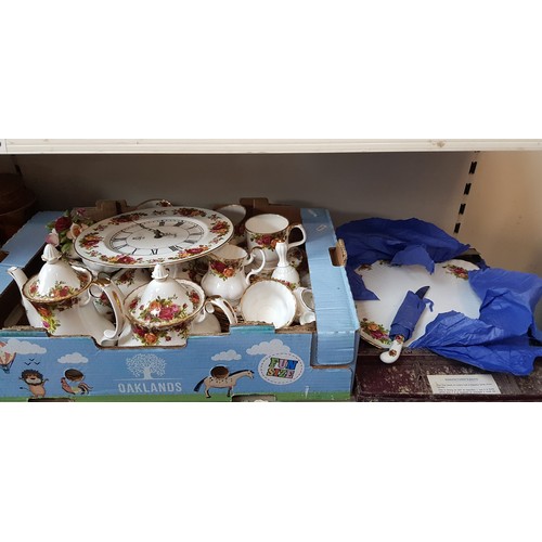 384 - A box of Royal Albert Old Country Roses pottery, approx 50 pieces including teapot, coffee pot, cloc... 