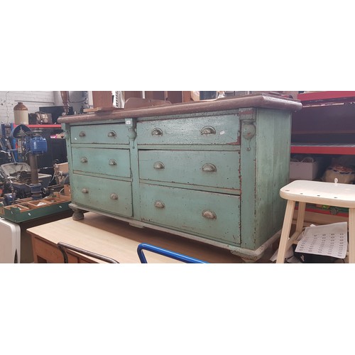 1014 - A green painted pine sideboard, circa 1900, height 87cm, length 166cm and depth 54cm.