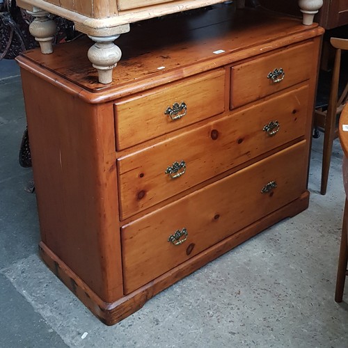 1016 - A late Victorian stained pine chest of drawers.