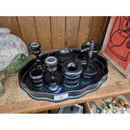 15 - An Antique enbony dressing table set.