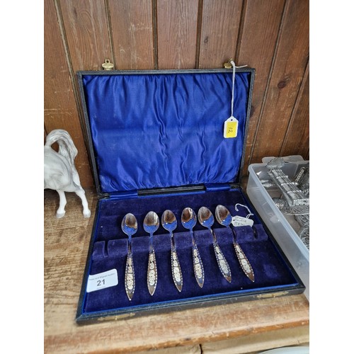 21 - Six white metal spoons marked 'S830'.