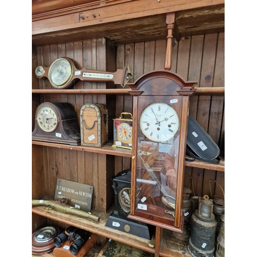 40 - A Comitti mahogany wall clock and a barometer.