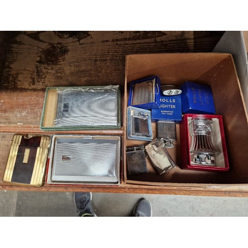 25 - A box of assorted lighters & 3 cigarette cases.