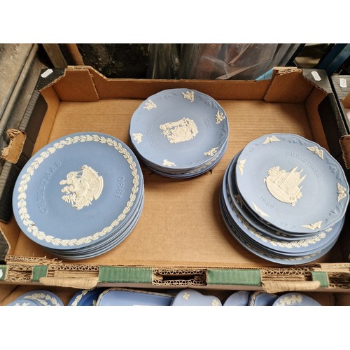 480 - A box of Wedgwood christmas plates, 26 in total.