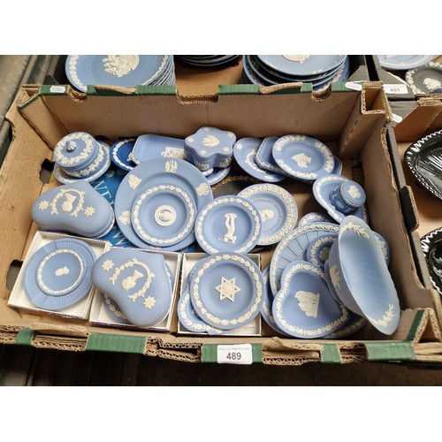 489 - A box of Wedgwood jasperware, mostly blue and white.