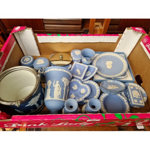 492 - A box of blue and white Wedgwood jasperware.