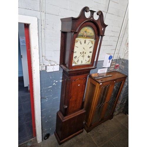 1020 - A Georgian 8 day oak longcase clock with weights, pendulum and key,