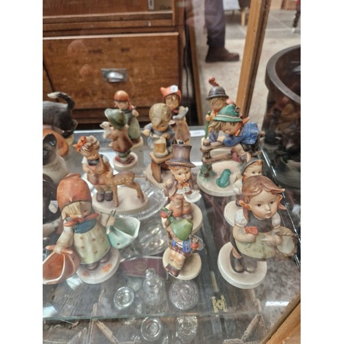 457 - 12 figures by Hummel/Goebel including Little Cellist and Cinderella