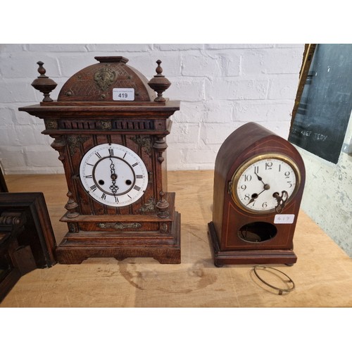 419 - An oak bracket clock and an inlaid mahogany mantle clock (both as found).