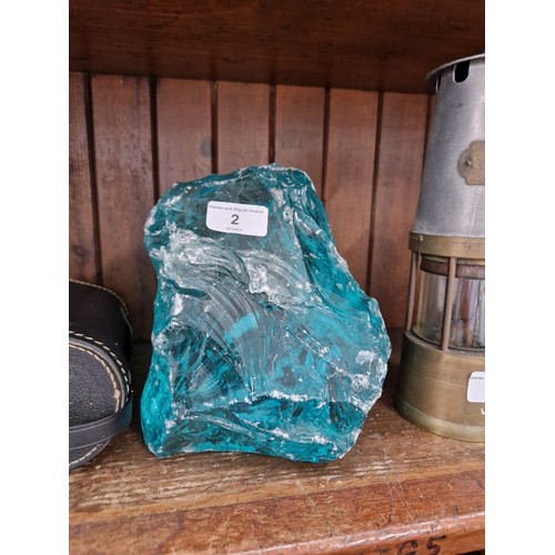 2 - A slag glass doorstop in kingfisher blue