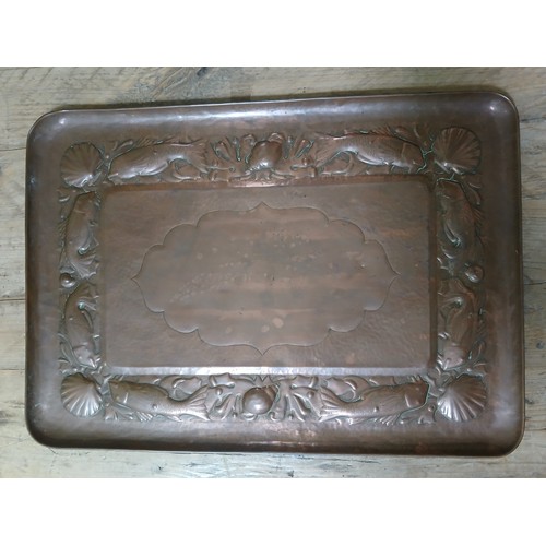 87 - A Newlyn School Arts & Crafts embossed copper tray decorated with fish and shells, labelled 'From Ja... 