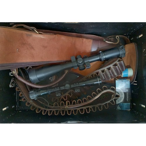 60 - Assorted militaria comprising two gun sights, ammo belts etc.