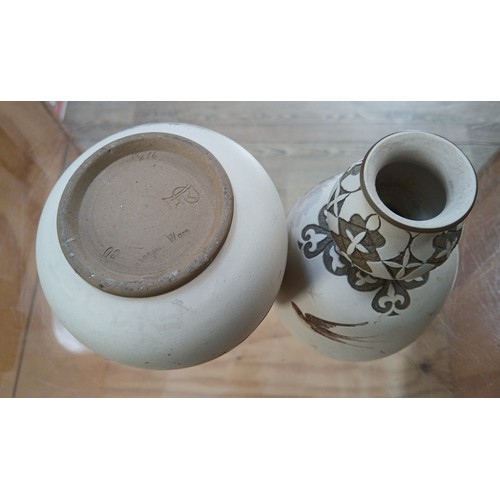 90 - A pair of Calvert & Lovatt Langley Ware stoneware vases, circa 1890s, decorated with swallows and sc... 