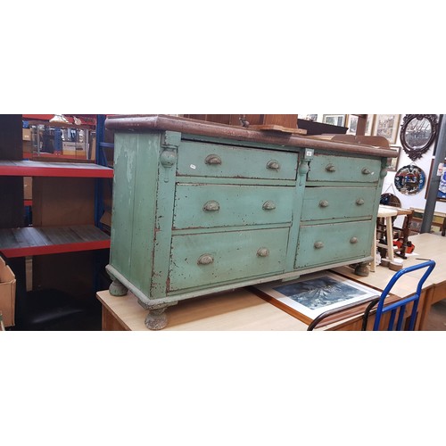 1014 - A green painted pine sideboard, circa 1900, height 87cm, length 166cm and depth 54cm.