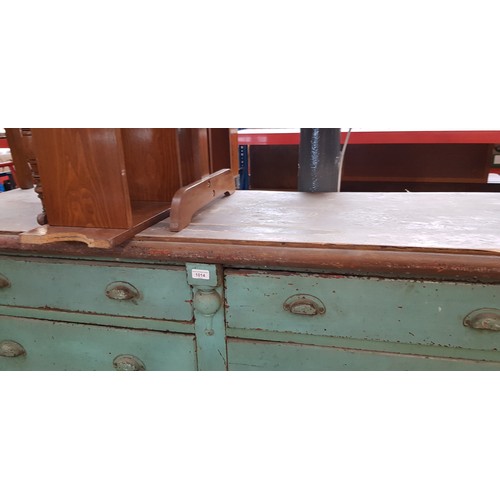 1014 - A green painted pine sideboard, circa 1900, height 87cm, length 166cm and depth 54cm.