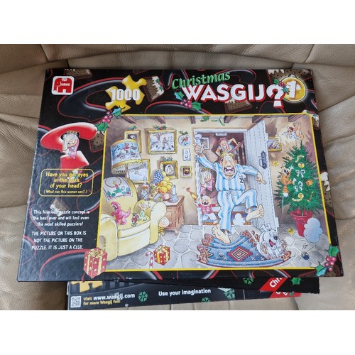 85 - A large collection of Wasgij puzzles, jigsaws, 3D puzzles, etc.