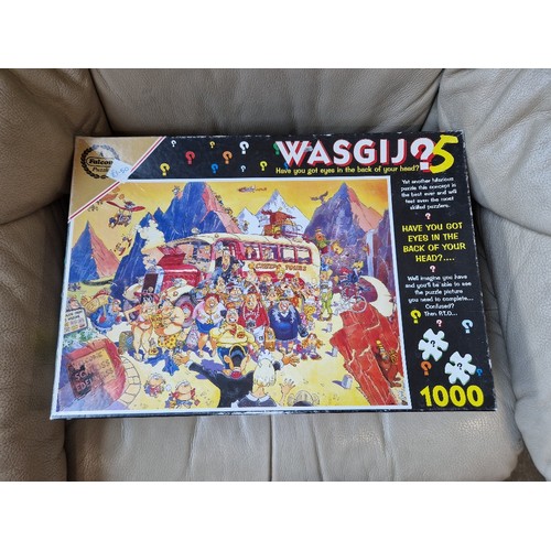 85 - A large collection of Wasgij puzzles, jigsaws, 3D puzzles, etc.