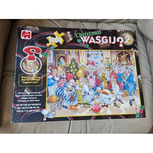 85 - A large collection of Wasgij puzzles, jigsaws, 3D puzzles, etc.