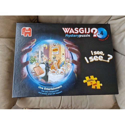 85 - A large collection of Wasgij puzzles, jigsaws, 3D puzzles, etc.