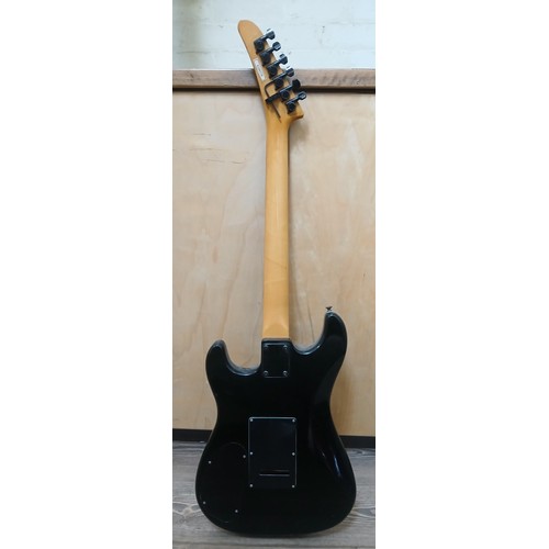 138 - A Gisbon Epiphone electric guitar, black body, serial no. 9100370, made in Korea.