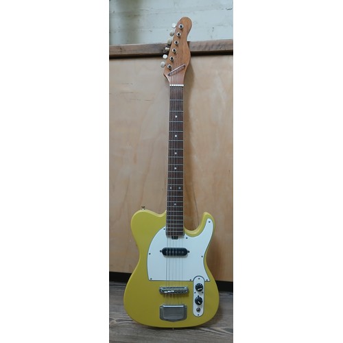 147 - A vintage Japanese Telecaster style style electric guitar, yellow body with white pick guard.